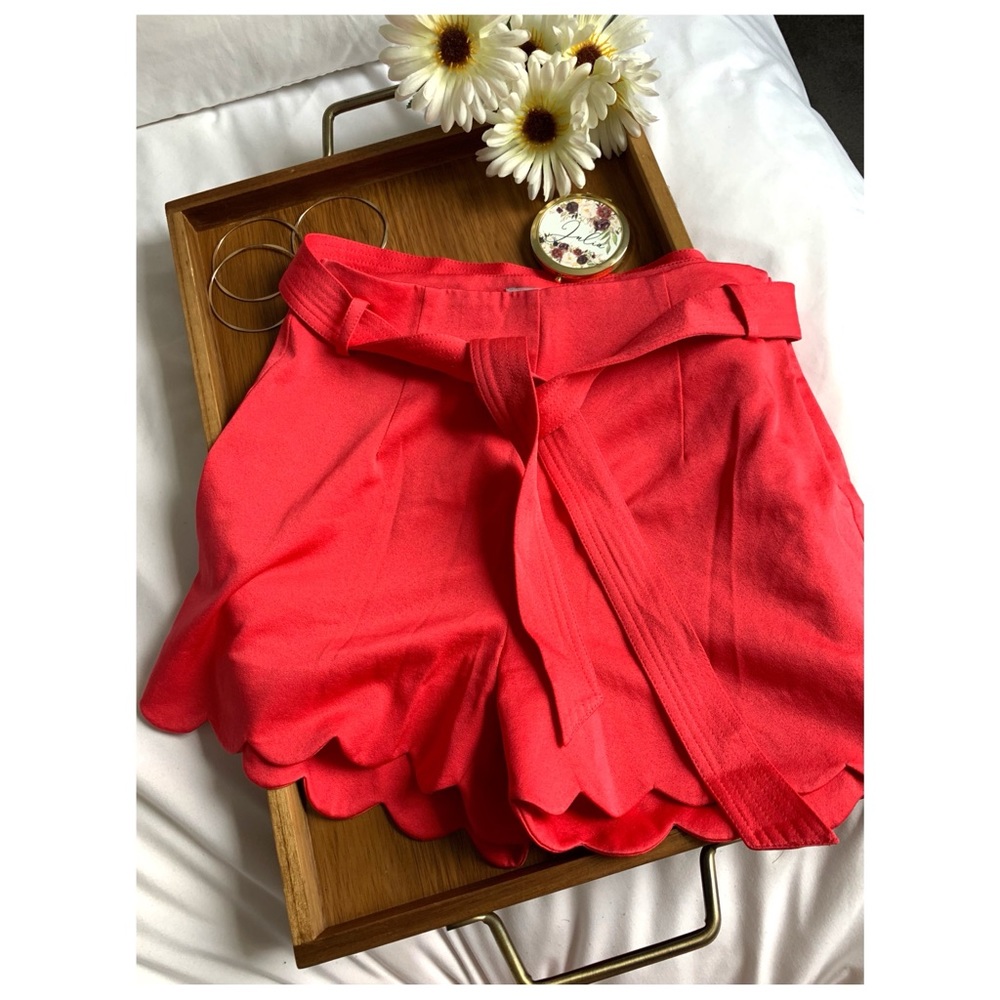 Punch pink scalloped shorts with belt